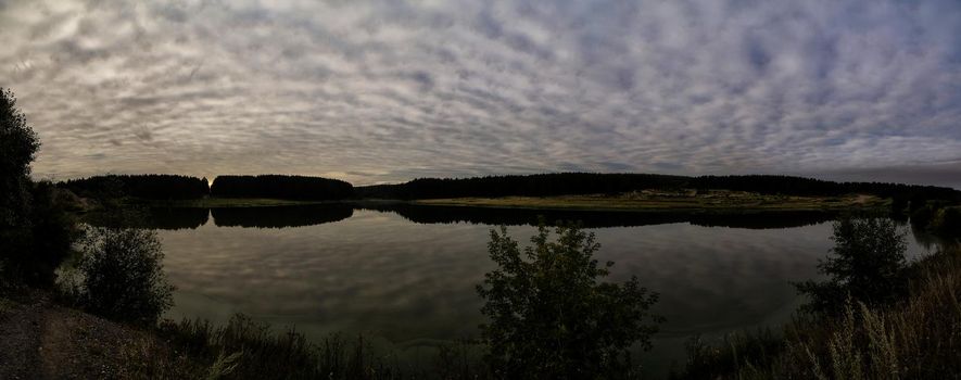 Lakes in the autumn forest. Forest autumn landscape, beautiful nature.