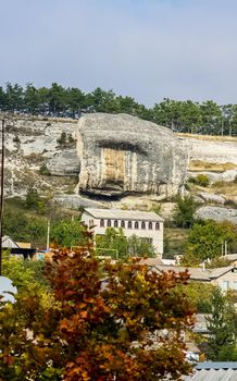 At home near the rocks. Stone houses in a mountain village. Crimea