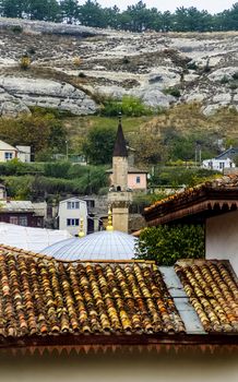 At home near the rocks. Stone houses in a mountain village. Crimea