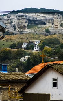 At home near the rocks. Stone houses in a mountain village. Crimea