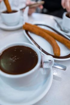 In Spain it is very typical to have chocolate with churros for breakfast.