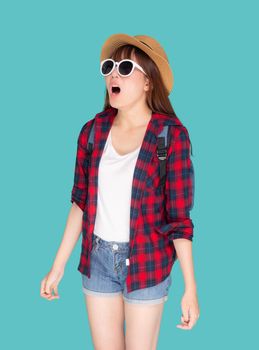 Beautiful young asian woman shouting sound loud with mouth for announce something in vacation travel with excited isolated on blue background, tourist asia girl journey in summer concept.