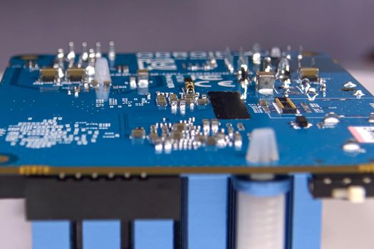 Pay a mini computer with a processor and interface connectors. Miniature computer technology.