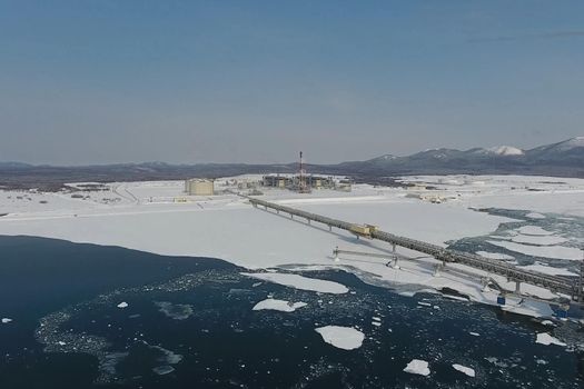 A liquefied natural gas plant and a terminal for its transportation.