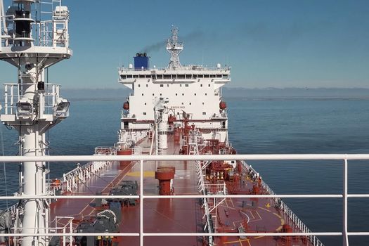 The tanker is filled with liquefied natural gas, transporting gas by sea.