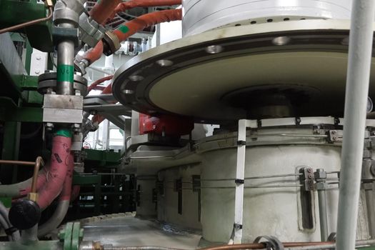 Murmansk, Russia - June 24, 2019: The engine compartment of the ship. Engine and steering equipment.