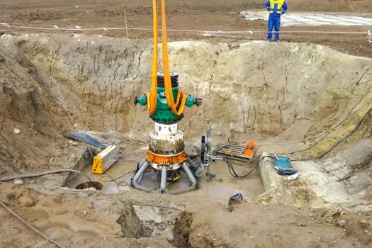 Demolition of oil well equipment. The old liquidated well.