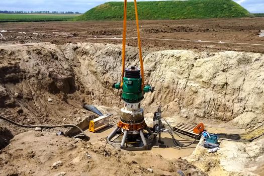 Demolition of oil well equipment. The old liquidated well.