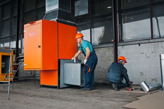 Moscow, Russia - January 23, 2019: Installation of the branching system by workers.