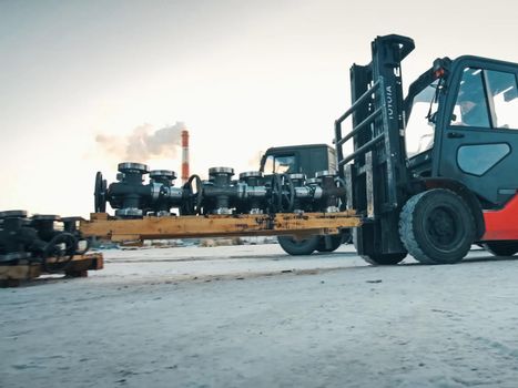 Moscow, Russia - January 23, 2019: Transporting oil catches on a loader.