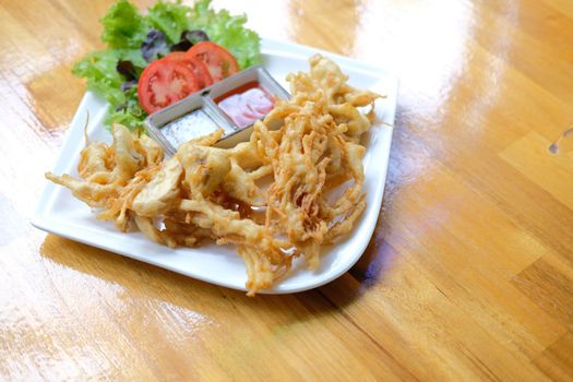 deep fried mushroom with dipping sauce and vegetable. vegetarian vegan appetizer