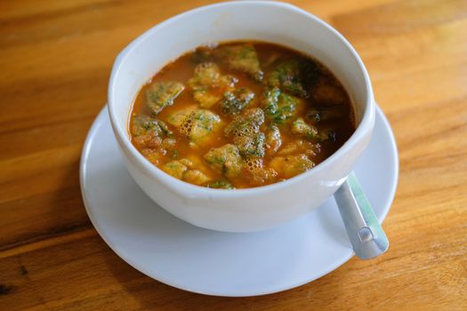 Sour curry soup made of Tamarind Paste with vegetable Acacia leaves omelet