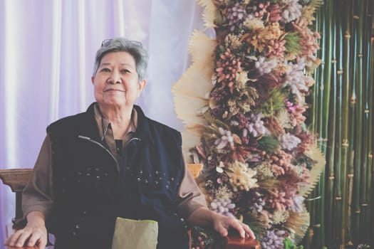 asian old elder woman elderly female relaxing resting at home. senior leisure lifestyle