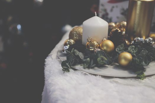 golden christmas balls. festive ornament decoration. candle, conifer cone