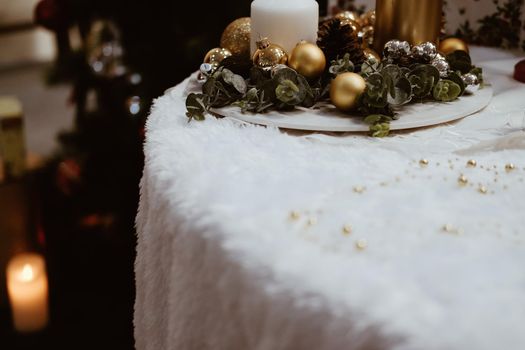 golden christmas balls. festive ornament decoration. candle, conifer cone