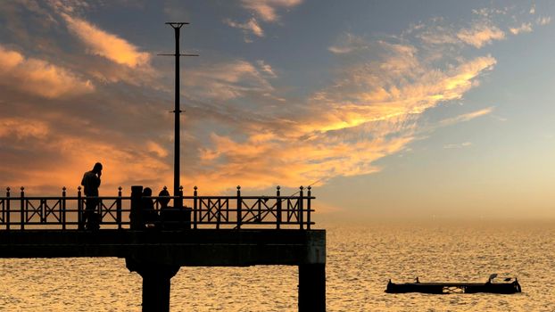 Bangsan Chonburi Thailand jetty and sunset. At Bangsan beach. Ao Thai Ocean. Beautiful sunset landscape, wooden shore jetty and colorful sky and cloud. Artistic beach sunset under wonderful sky. Recreation concept.