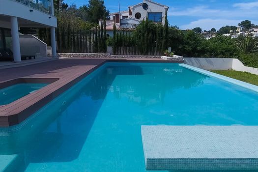 A small house with a swimming pool on the shores of the Mediterranean Sea. Accommodation in Spain.