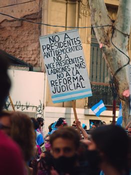 2020-10-12, Mendoza, Argentina: During a protest against the government, a sign reading "No to antidemocratic presidents, no to thieving vicepresidents, no to the judicial reform"