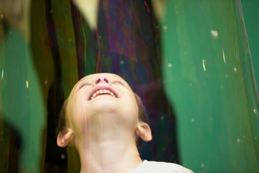 Belarus, Gomel, November 9, 2017. Gomel Children's Center.The boy inside the soap bubble on the show.