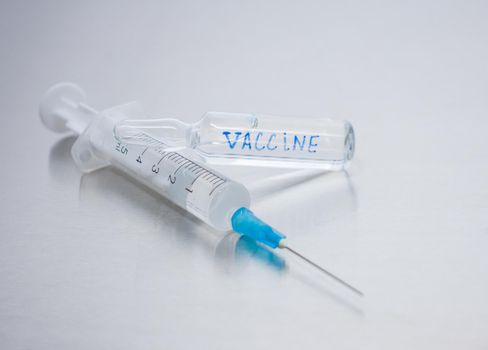 Close-up of the vaccine in a sealed vial. Kit for vaccination.