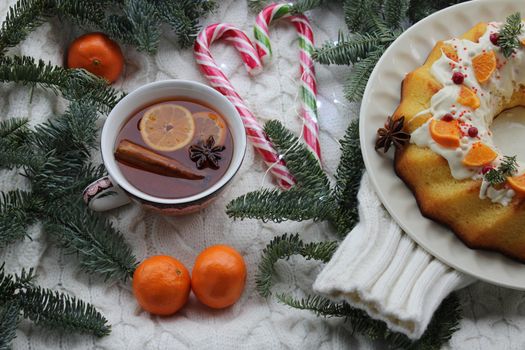 Tea with cinnamon and tangerine pie.Texture or background