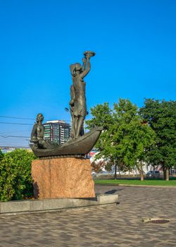 Dnipro, Ukraine 07.18.2020. Sculpture Youth of the Dnieper on the Dnipro embankment on a sunny summer morning