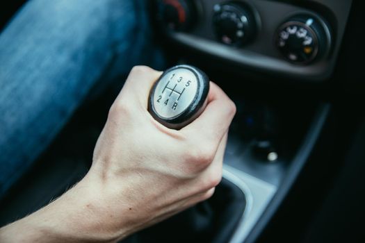 Close up of a shift lever, sports car