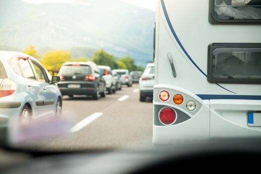 Cars on a highway, traffic jam in summer season
