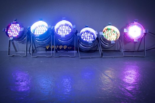 Party lighting: Colorful LED spots on the floor, hall