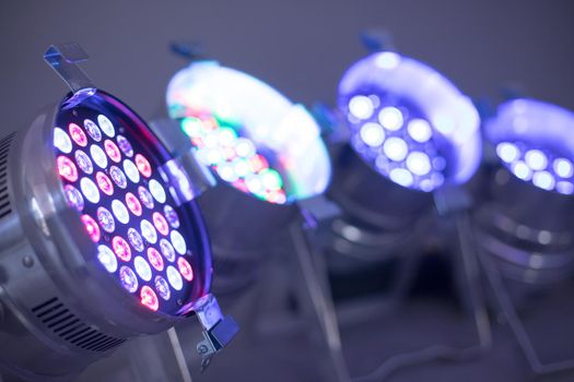 Party lighting: Colorful LED spots on the floor, hall