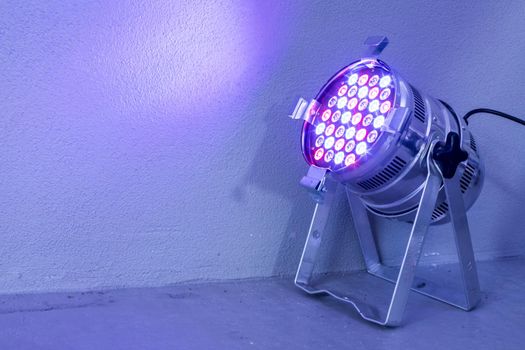 Party lighting: Colorful LED spots on the floor, hall