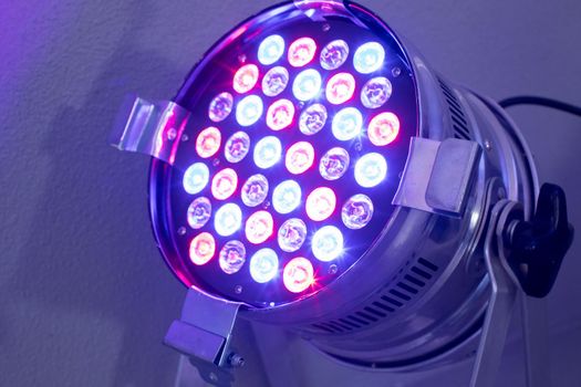 Party lighting: Colorful LED spots on the floor, hall