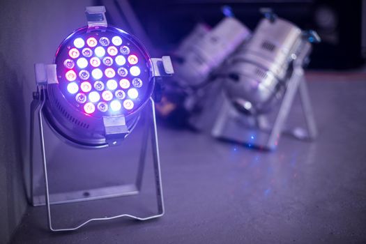 Party lighting: Colorful LED spots on the floor, hall