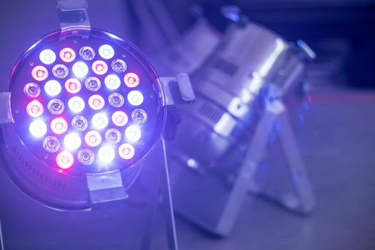 Party lighting: Colorful LED spots on the floor, hall