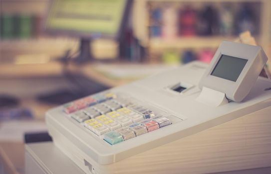 Cash register in a shop: Customer is paying purchase