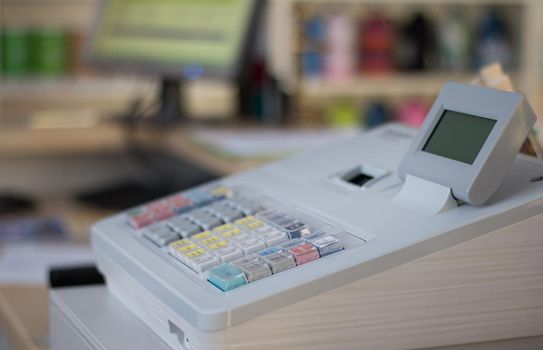 Cash register in a shop: Customer is paying purchase