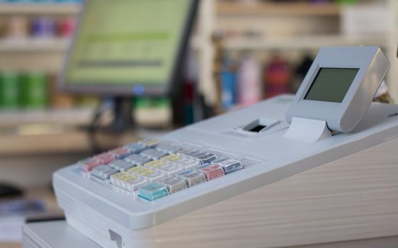 Cash register in a shop: Customer is paying purchase