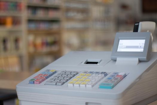 Cash register in a shop: Customer is paying purchase