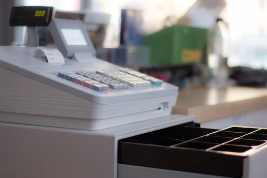 Cash register in a shop: Customer is paying purchase