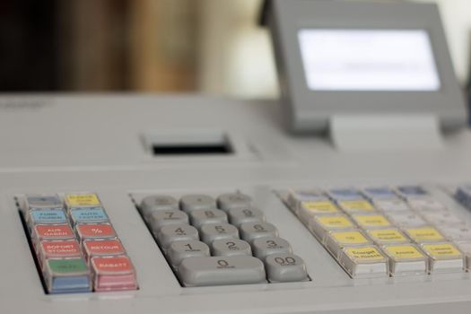 Cash register in a shop: Customer is paying purchase