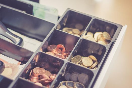 Cash register in a shop: Customer is paying purchase