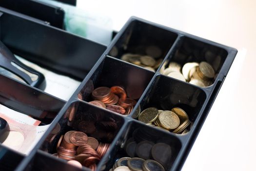 Cash register in a shop: Customer is paying purchase