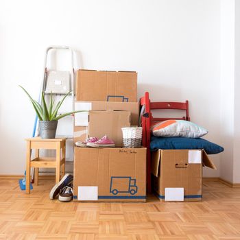 Move. Cardboard boxes, cleaning stuff and things for moving into a new home