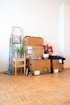 Move. Cardboard boxes, cleaning stuff and things for moving into a new home