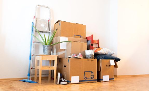 Move. Cardboard boxes, cleaning stuff and things for moving into a new home