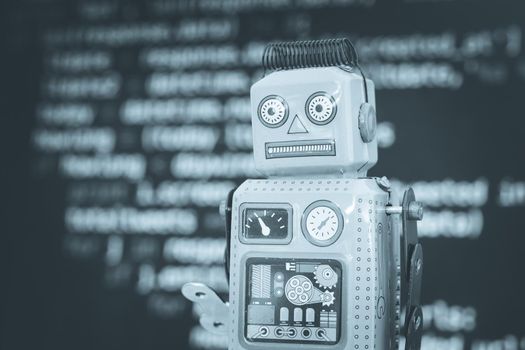 Symbol for a chatbot or social bot and algorithms, program code in the background