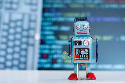 Symbol for a chatbot or social bot and algorithms, program code in the background