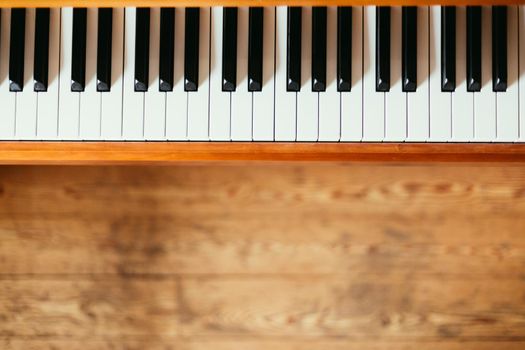 Vintage wooden piano keys with text space