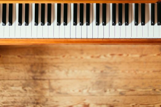 Vintage wooden piano keys with text space