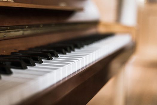 Rustic piano keys, close up picture. Classical instrument.